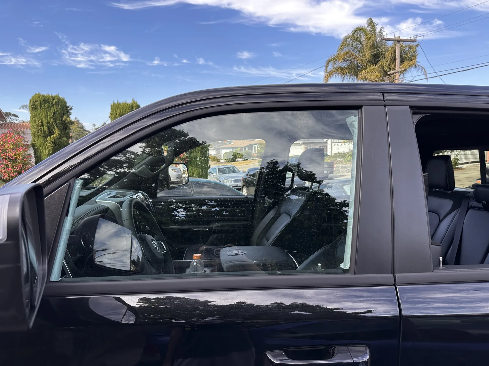 Truck window before tint installation with clear glass