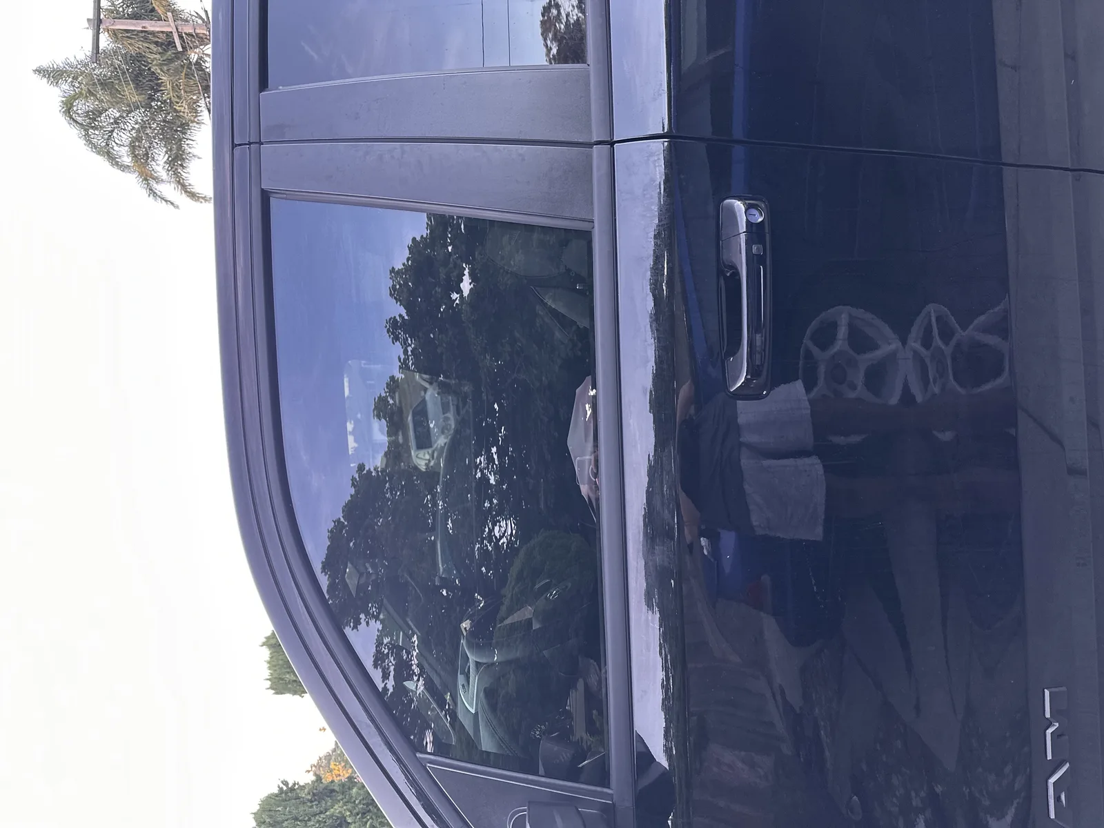 Truck window after tint installation with darkened glass